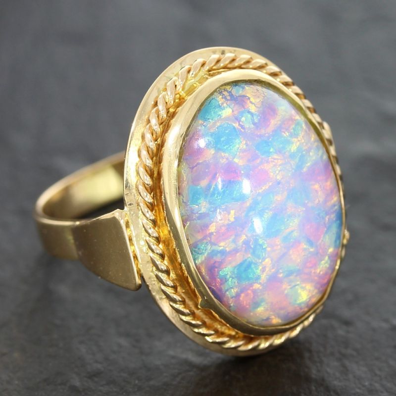 Damen Ring aus 583 Rotgold mit ovaler Opaldublette