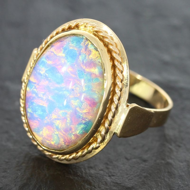 Damen Ring aus 583 Rotgold mit ovaler Opaldublette